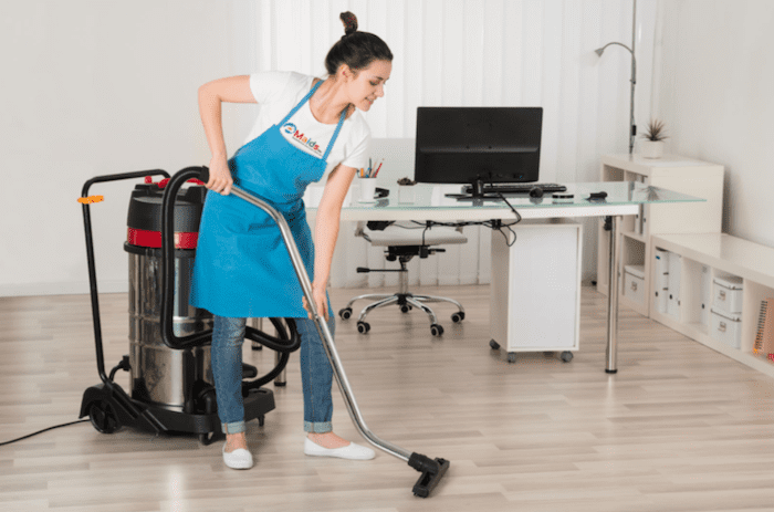 emaids commercial maids in an office cleaning